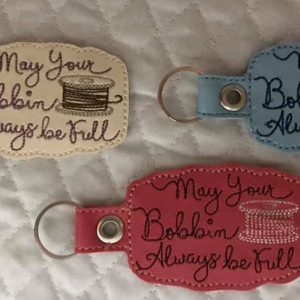 Sewing Quote Key Chain – “May Your Bobbin Always Be Full”